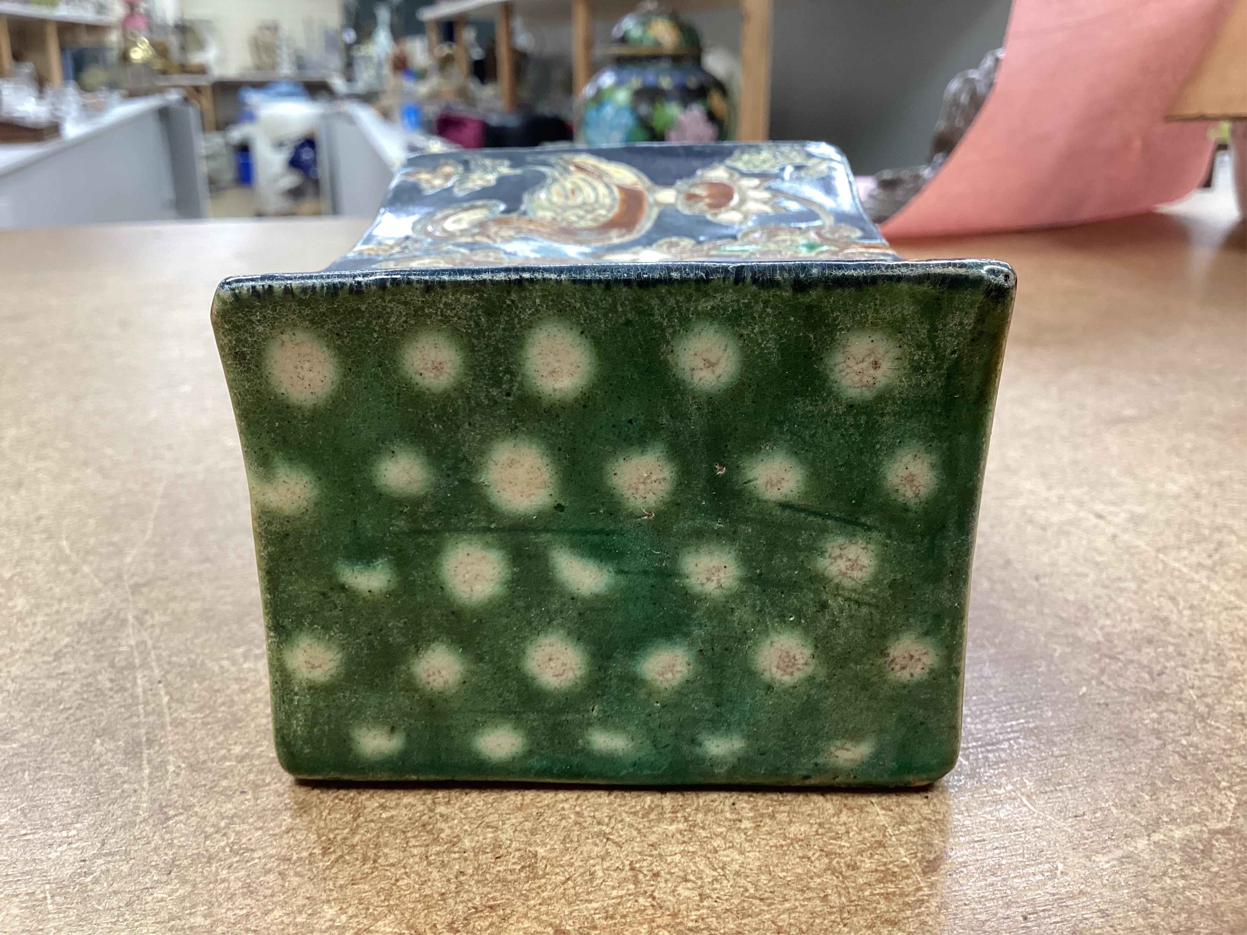 A Chinese stone ware arm rest, 10cm wide